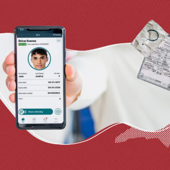 Person holding a cell phone where the digital driver license is seen as the new digital ID
